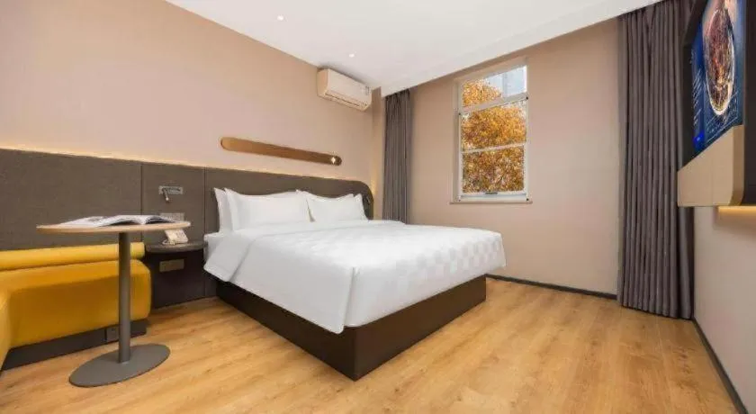 Bed in Jinjiang Inn Henan Museum Hutun Metro Station