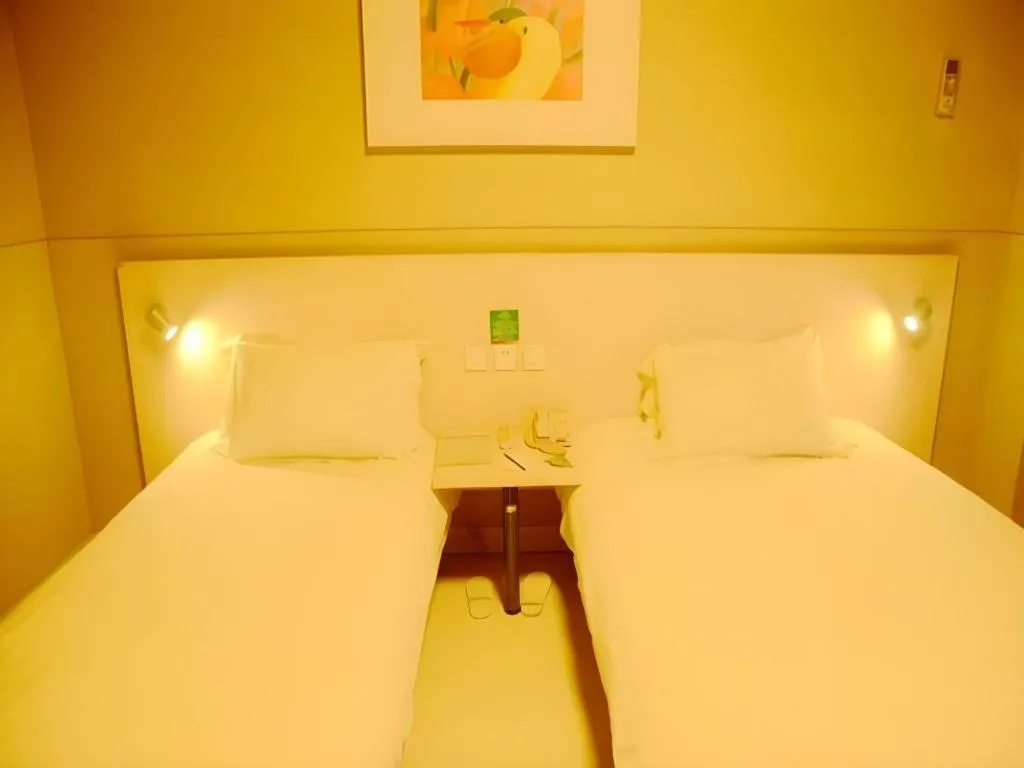 Bed in Jinjiang Inn Changzhou Global Dinosaur City Olympic Center