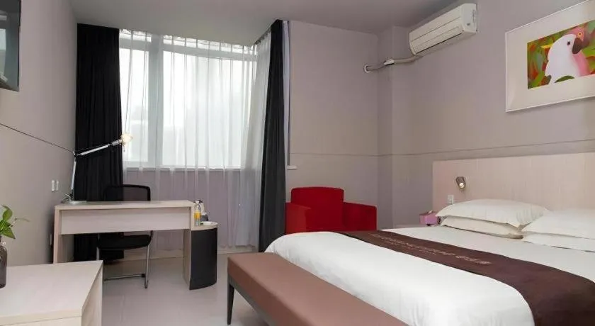 Bed in Jinjiang Inn Changzhou Global Dinosaur City Olympic Center