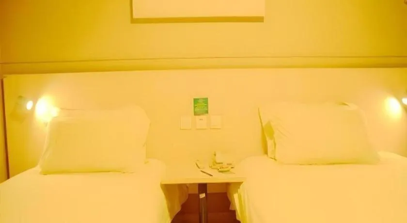 Bed in Jinjiang Inn Changzhou Global Dinosaur City Olympic Center