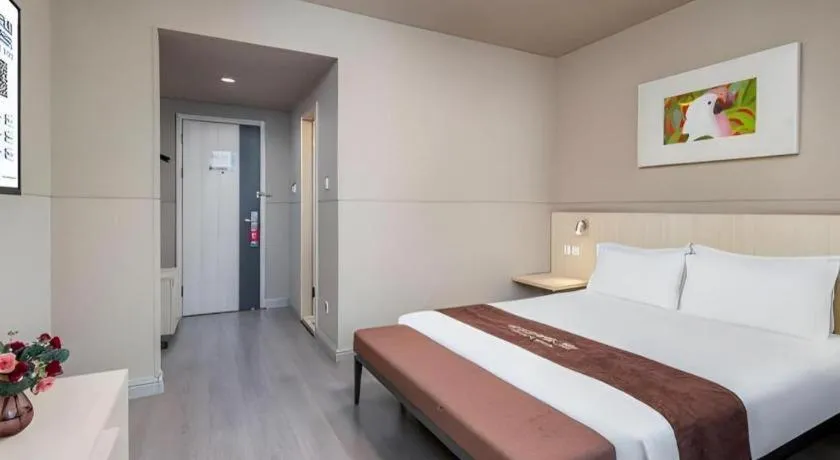 Bed in Jinjiang Inn Changzhou Global Dinosaur City Olympic Center