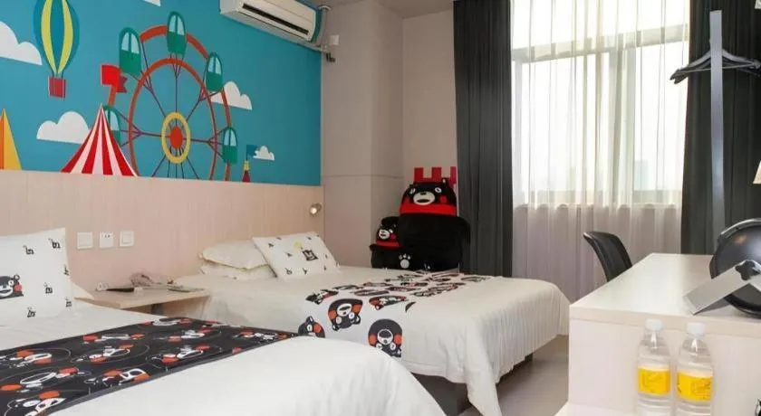 Bed in Jinjiang Inn Changzhou Global Dinosaur City Olympic Center