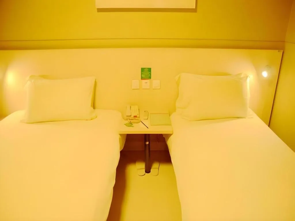 Bed in Jinjiang Inn Changzhou Global Dinosaur City Olympic Center