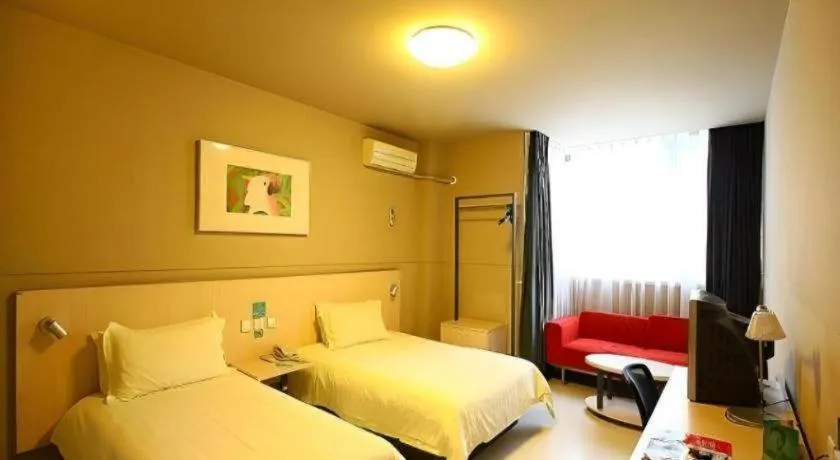 Bed in Jinjiang Inn Changzhou Global Dinosaur City Olympic Center