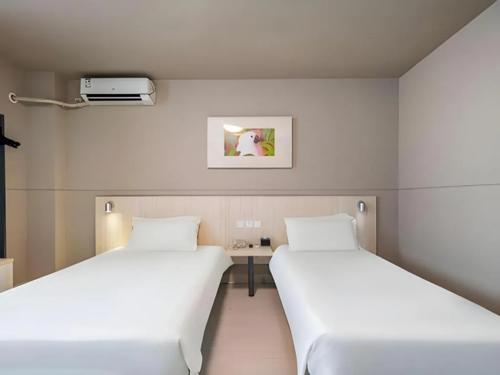 Bed in Jinjiang Inn Changzhou Global Dinosaur City Olympic Center