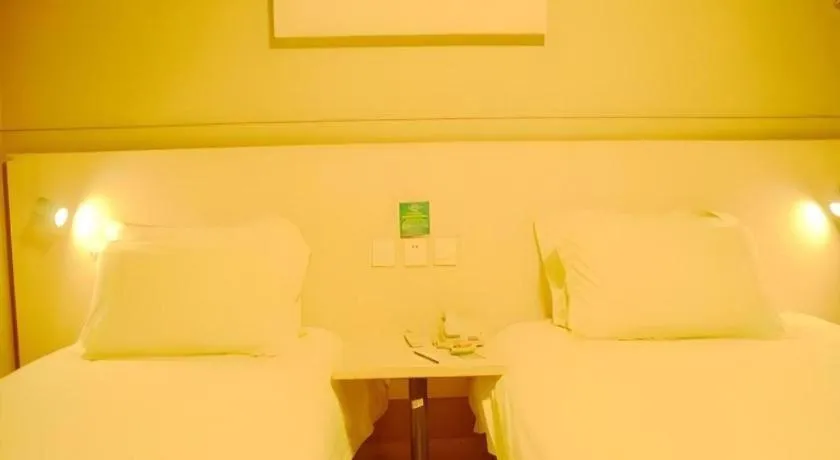Bed in Jinjiang Inn Changzhou Global Dinosaur City Olympic Center