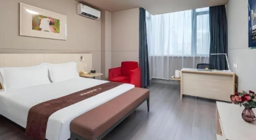 Bed in Jinjiang Inn Changzhou Global Dinosaur City Olympic Center