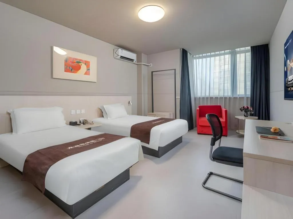 Bed in Jinjiang Inn Changzhou Global Dinosaur City Olympic Center