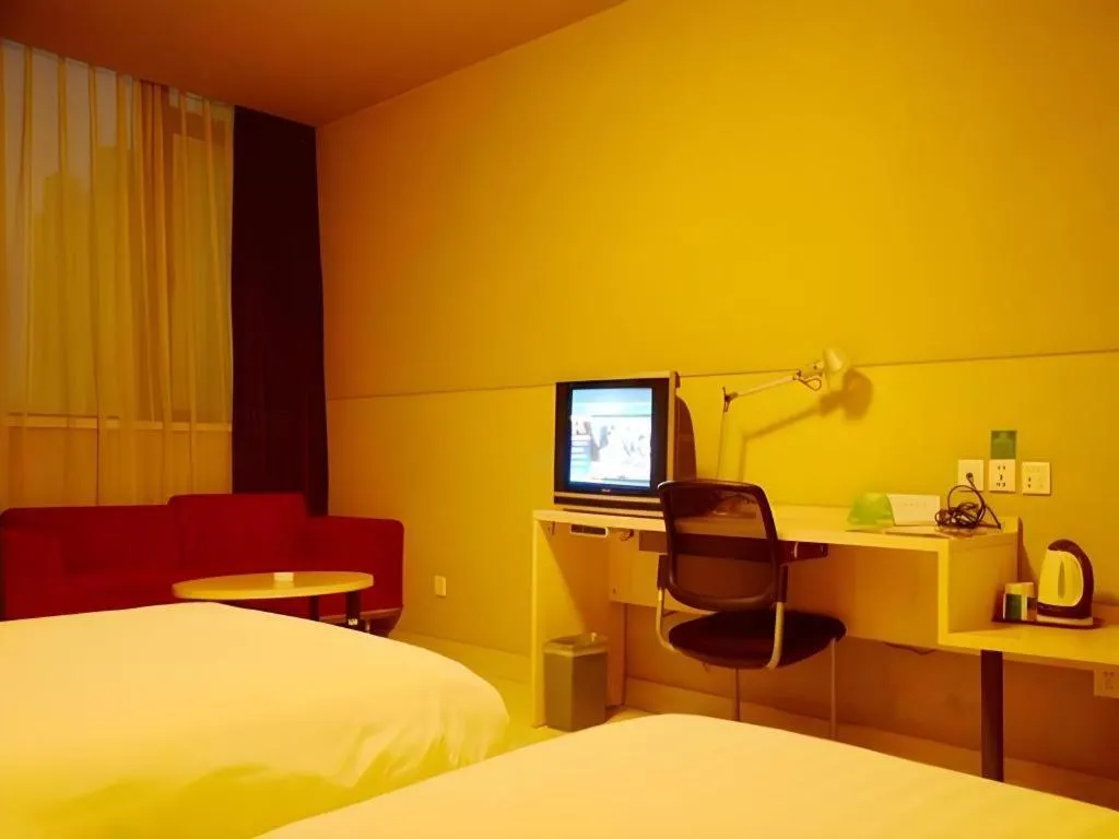 Bed in Jinjiang Inn Changzhou Global Dinosaur City Olympic Center