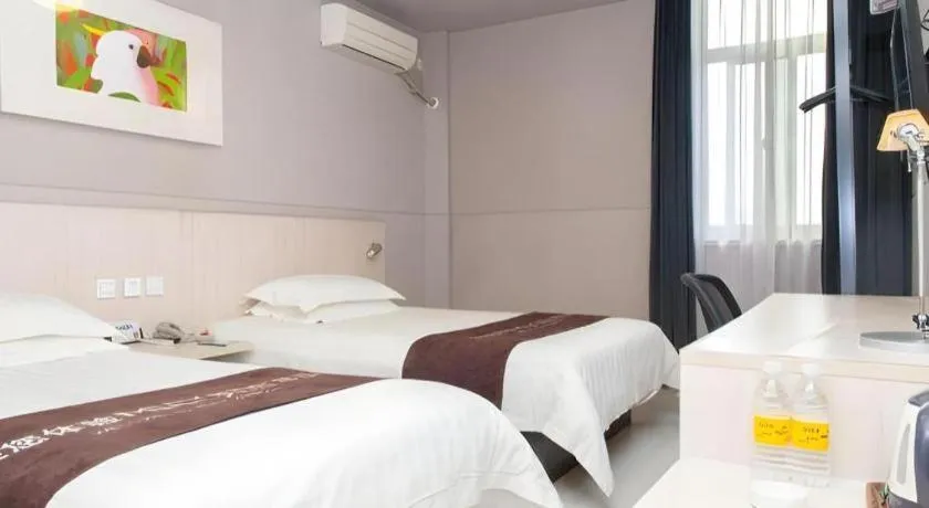Bed in Jinjiang Inn Changzhou Global Dinosaur City Olympic Center