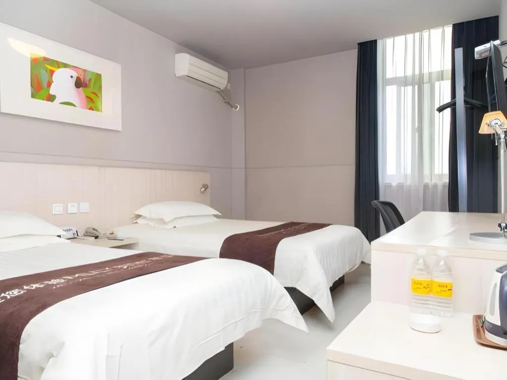 Bed in Jinjiang Inn Changzhou Global Dinosaur City Olympic Center