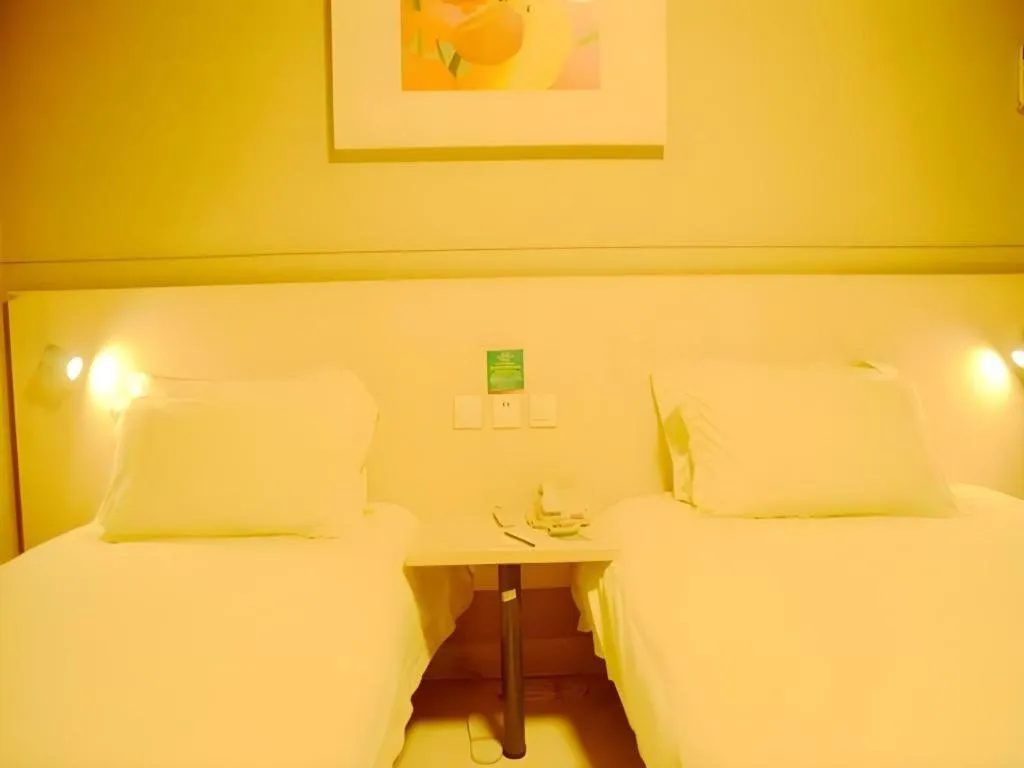 Bed in Jinjiang Inn Changzhou Global Dinosaur City Olympic Center