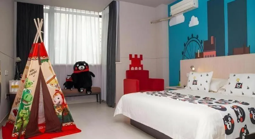 Bed in Jinjiang Inn Changzhou Global Dinosaur City Olympic Center