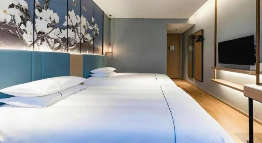 Bed in Jinjiang Inn Zhangjiagang Yangshe West Street Pedestrian Street