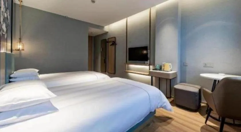 Bed in Jinjiang Inn Zhangjiagang Yangshe West Street Pedestrian Street