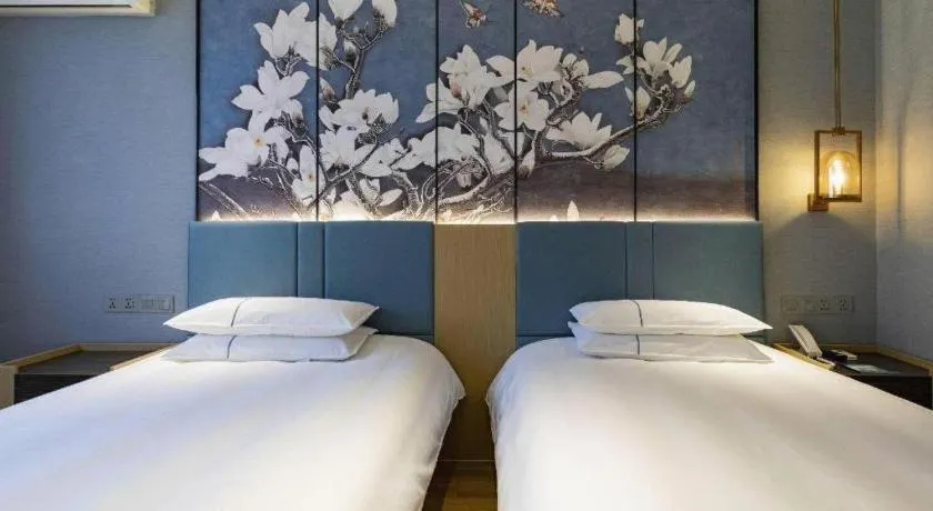 Bed in Jinjiang Inn Zhangjiagang Yangshe West Street Pedestrian Street