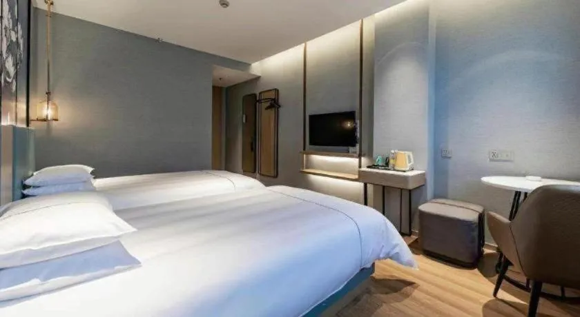 Bed in Jinjiang Inn Zhangjiagang Yangshe West Street Pedestrian Street