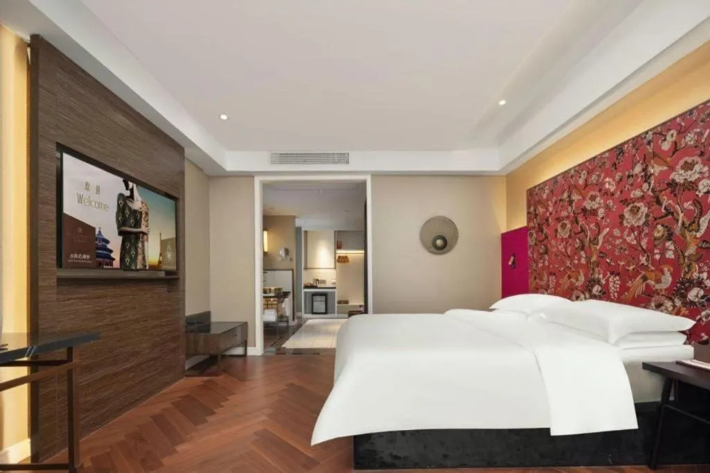 Bed in Jinjiang Metropolo Hotel - Taizhou Wanda Plaza