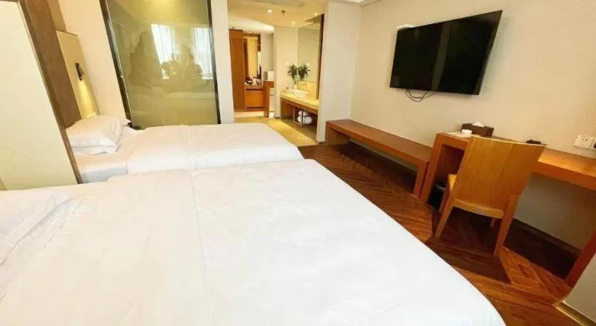 Bed in Jinjiang Metropolo Hotel - Taizhou Wanda Plaza