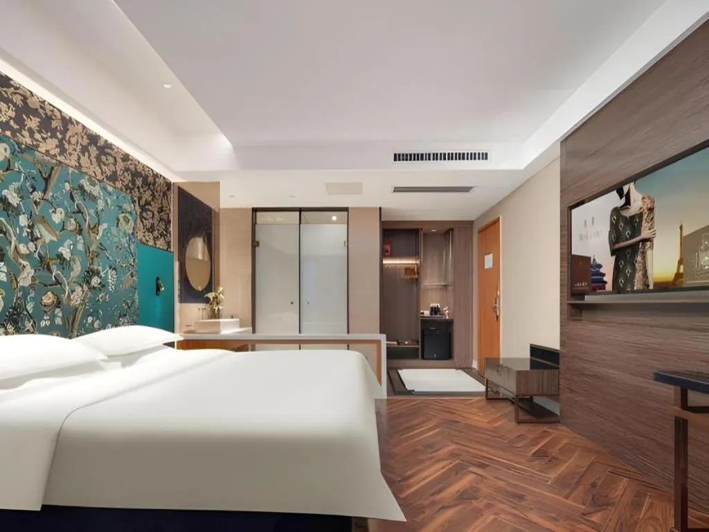 Bed in Jinjiang Metropolo Hotel - Taizhou Wanda Plaza