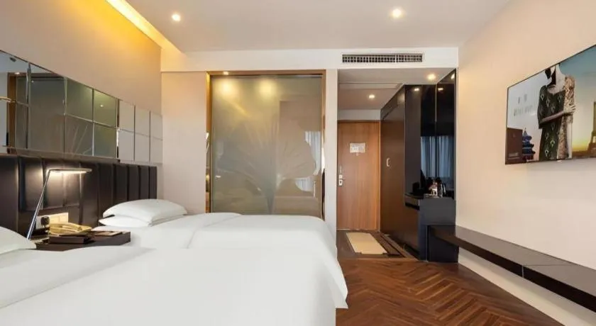 Bed in Jinjiang Metropolo Hotel - Taizhou Wanda Plaza