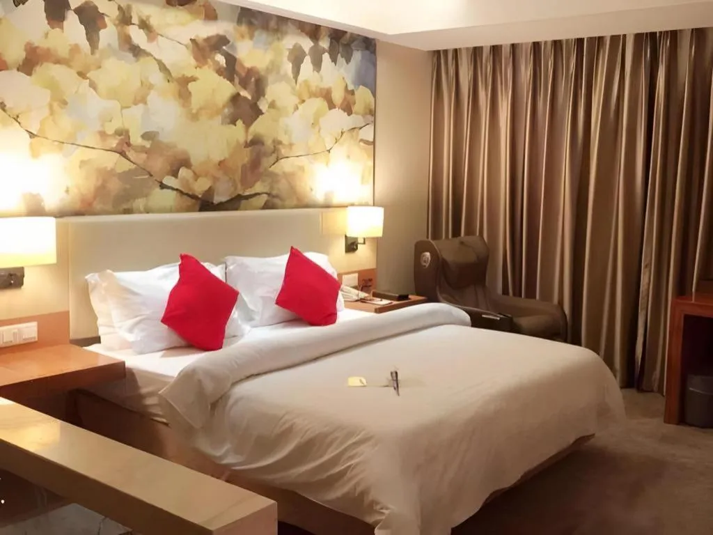 Bed in Jinjiang Metropolo Hotel - Taizhou Wanda Plaza