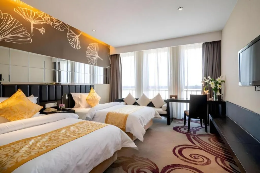 Bed in Jinjiang Metropolo Hotel - Taizhou Wanda Plaza