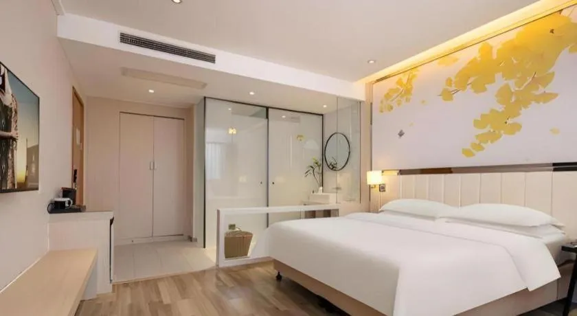 Bed in Jinjiang Metropolo Hotel - Taizhou Wanda Plaza