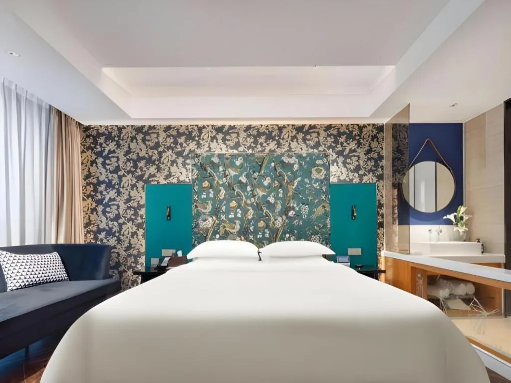 Bed in Jinjiang Metropolo Hotel - Taizhou Wanda Plaza