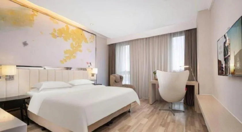 Bed in Jinjiang Metropolo Hotel - Taizhou Wanda Plaza