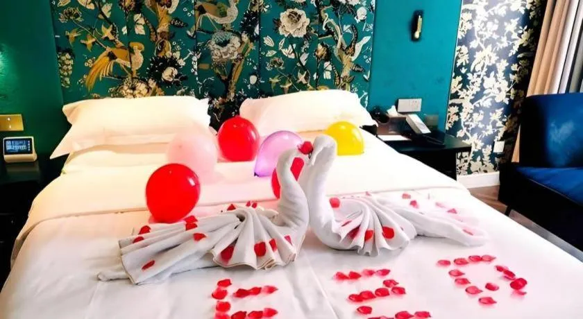 Bed in Jinjiang Metropolo Hotel - Taizhou Wanda Plaza