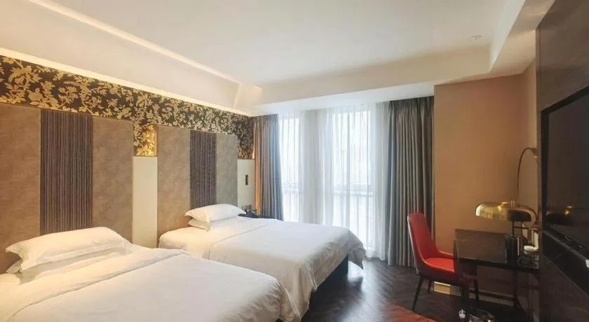 Bed in Jinjiang Metropolo Hotel - Taizhou Wanda Plaza