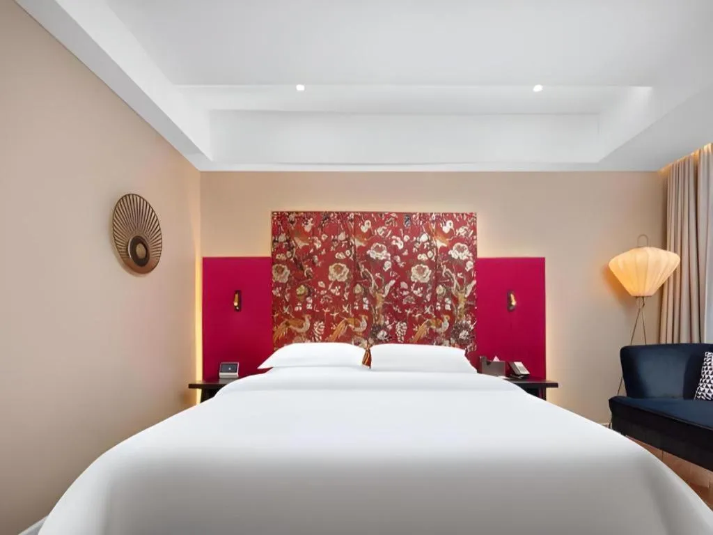 Bed in Jinjiang Metropolo Hotel - Taizhou Wanda Plaza