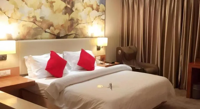 Bed in Jinjiang Metropolo Hotel - Taizhou Wanda Plaza