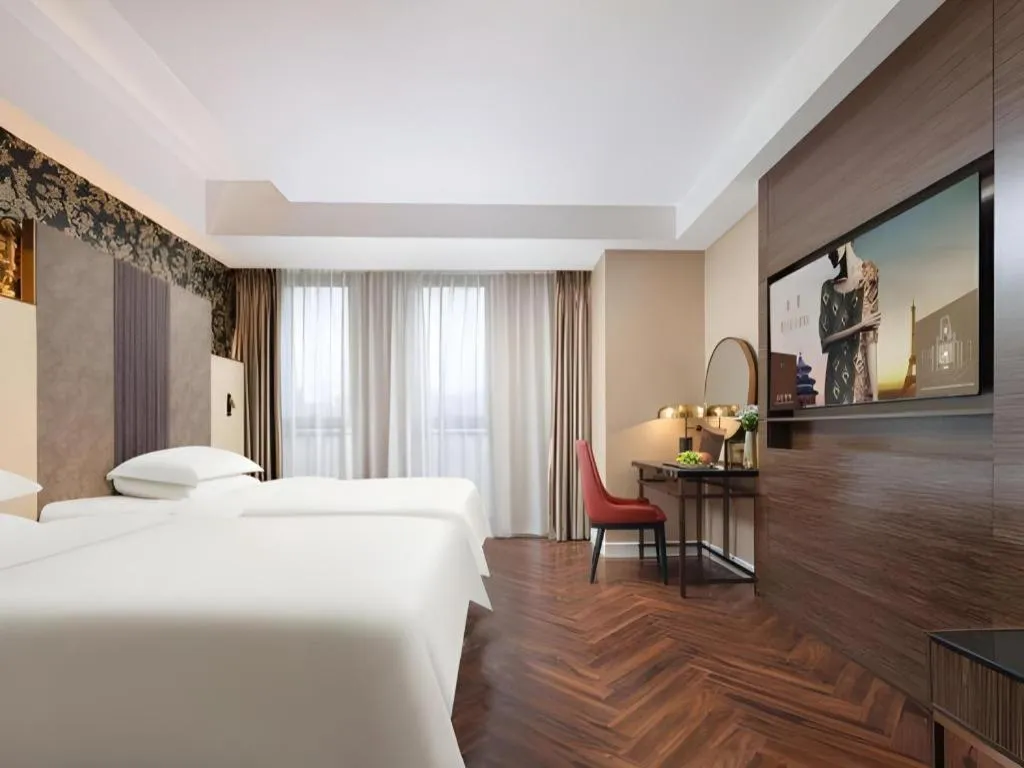Bed in Jinjiang Metropolo Hotel - Taizhou Wanda Plaza