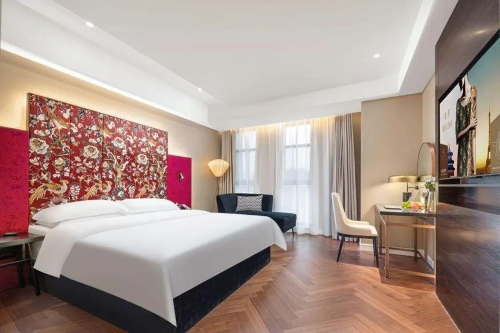 Bed in Jinjiang Metropolo Hotel - Taizhou Wanda Plaza