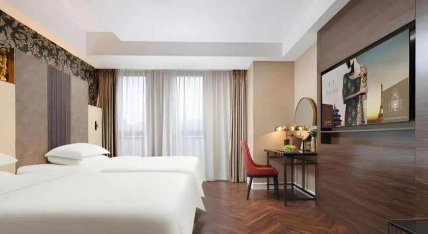 Bed in Jinjiang Metropolo Hotel - Taizhou Wanda Plaza