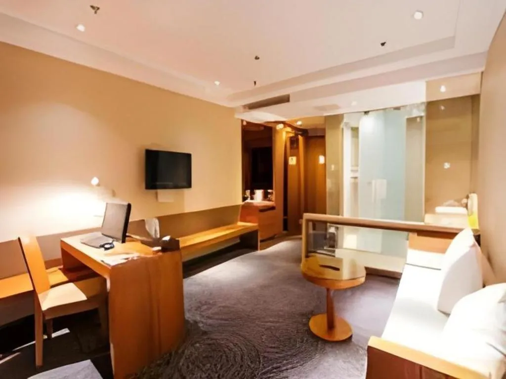 Bed in Jinjiang Metropolo Hotel - Taizhou Wanda Plaza