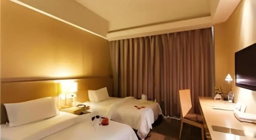 Bed in Jinjiang Metropolo Hotel - Langfang Wanda Plaza