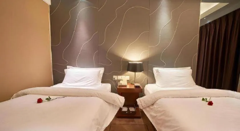 Bed in Metropolo Hotel Shijiazhuang Yuhua Wanda Plaza