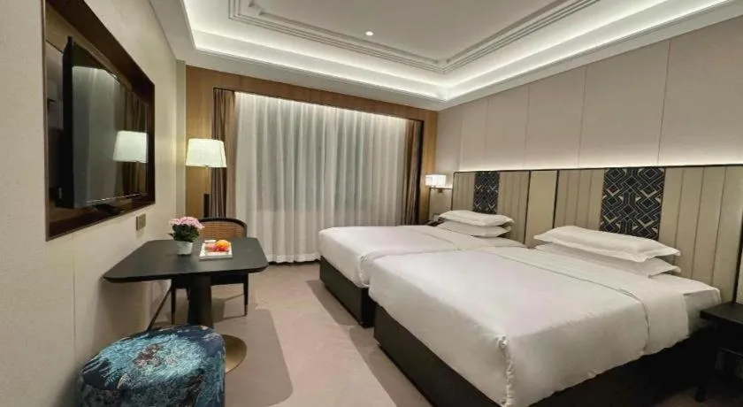 Bed in Metropolo Hotel Shijiazhuang Yuhua Wanda Plaza