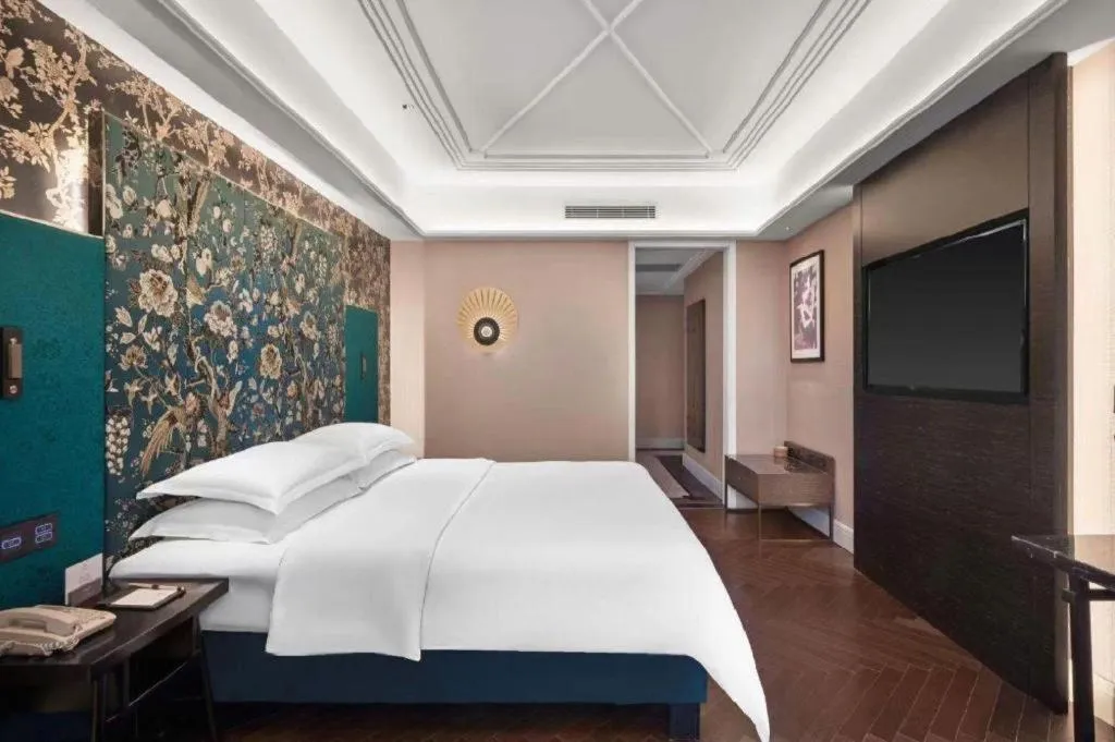 Bed in Metropolo Hotel Shijiazhuang Yuhua Wanda Plaza