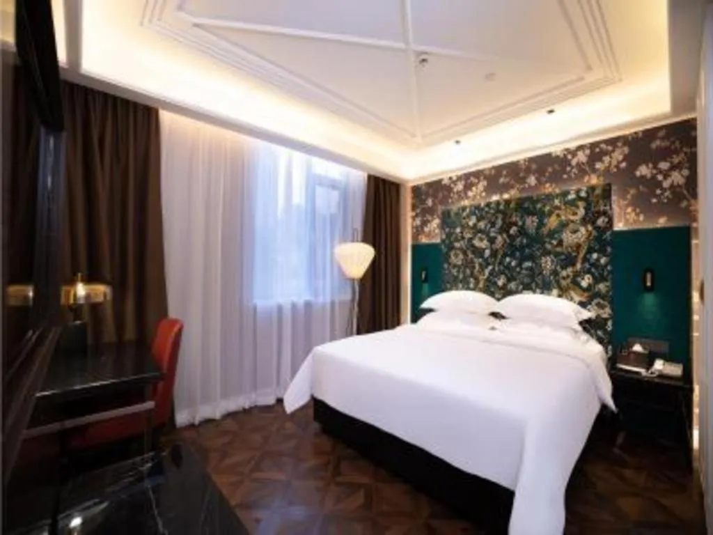 Bed in Metropolo Hotel Shijiazhuang Yuhua Wanda Plaza