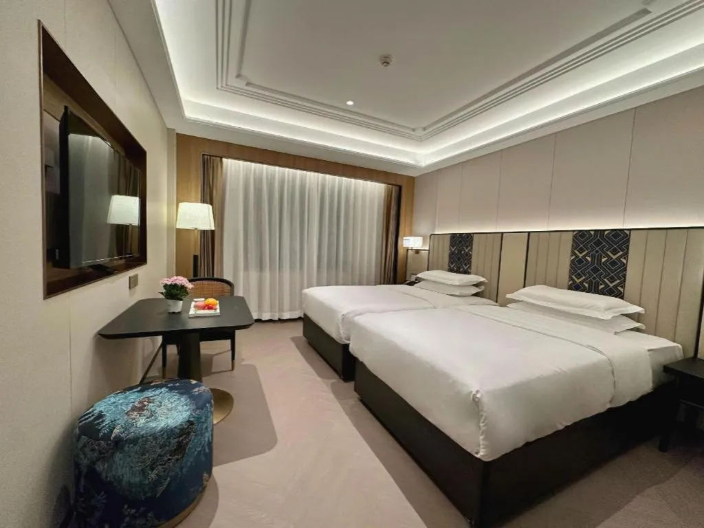 Bed in Metropolo Hotel Shijiazhuang Yuhua Wanda Plaza