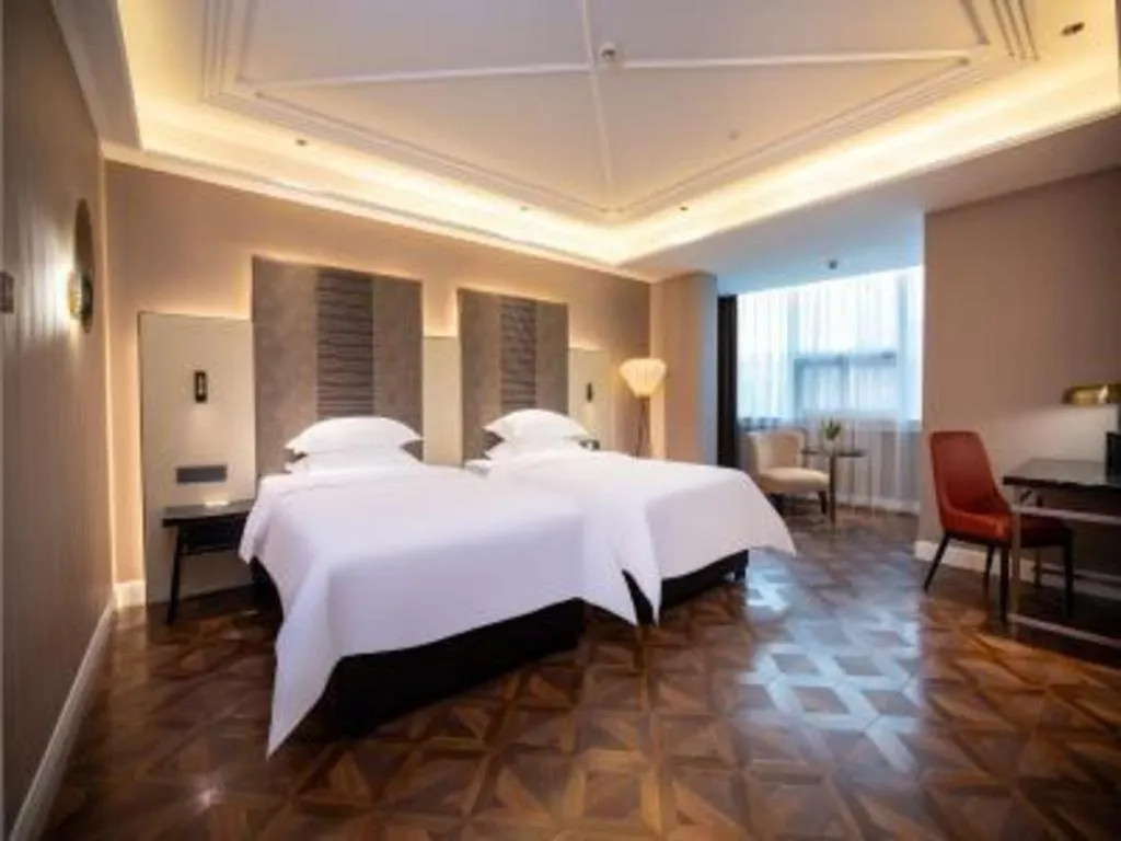 Bed in Metropolo Hotel Shijiazhuang Yuhua Wanda Plaza