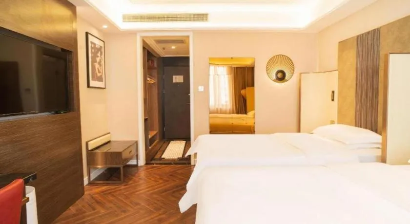 Bed in Metropolo Hotel Shijiazhuang Yuhua Wanda Plaza