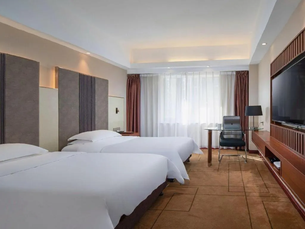 Bed in Metropolo Hotel Shijiazhuang Yuhua Wanda Plaza