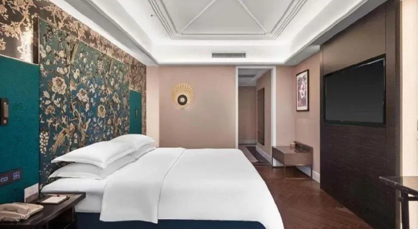 Bed in Metropolo Hotel Shijiazhuang Yuhua Wanda Plaza