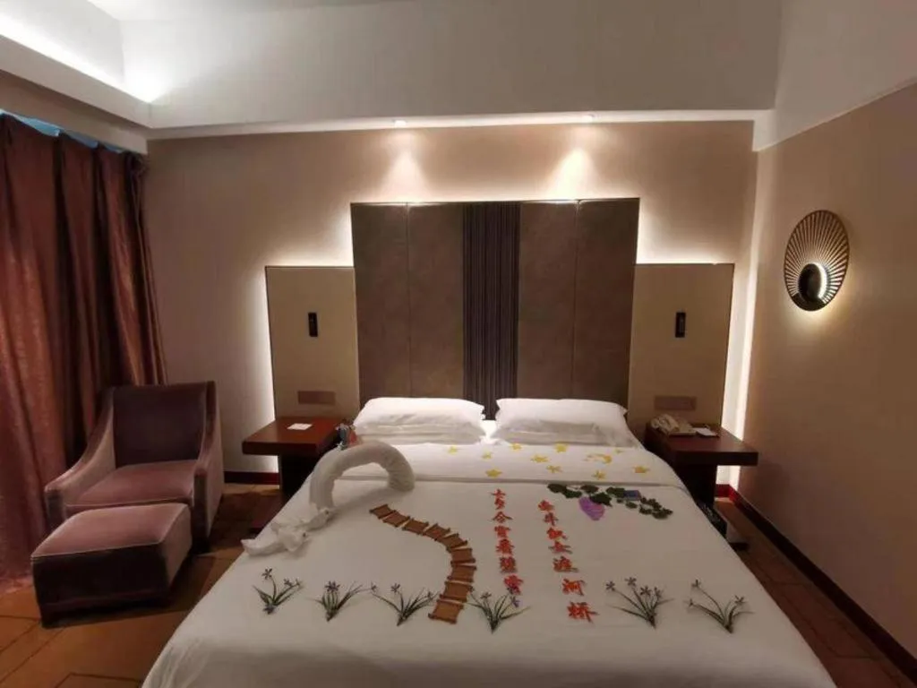 Bed in Metropolo Hotel Shijiazhuang Yuhua Wanda Plaza