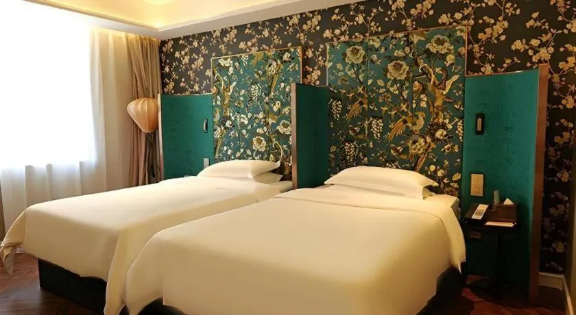 Bed in Metropolo Hotel Shijiazhuang Yuhua Wanda Plaza